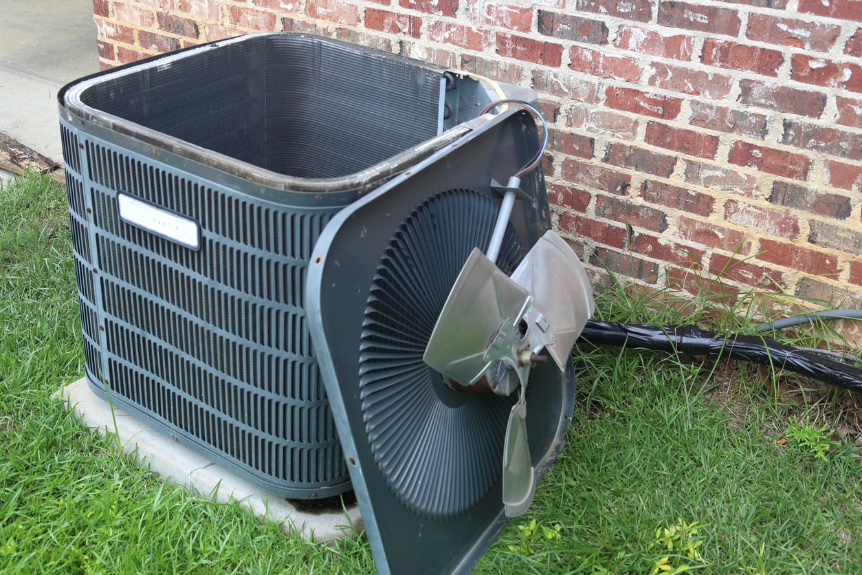 Fan off the top of Air Conditioner Condenser during maintenance